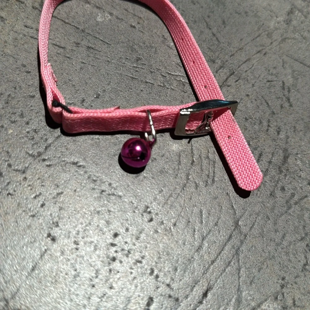 Pink Rhinestone Cat Collar or small dog, adorned with rhinestones and a bell.